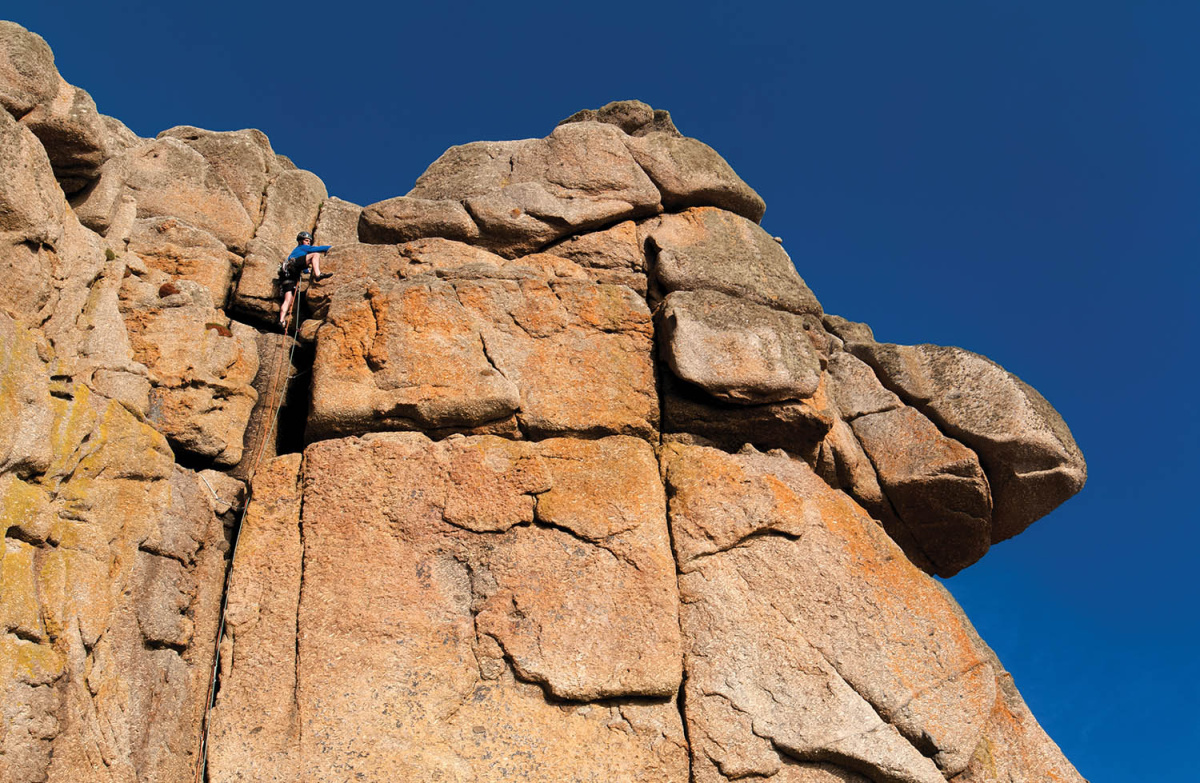 A climber on the well-protected Vertical Crack (HS) at Sennen Cove. Photo: © Simon Cardy