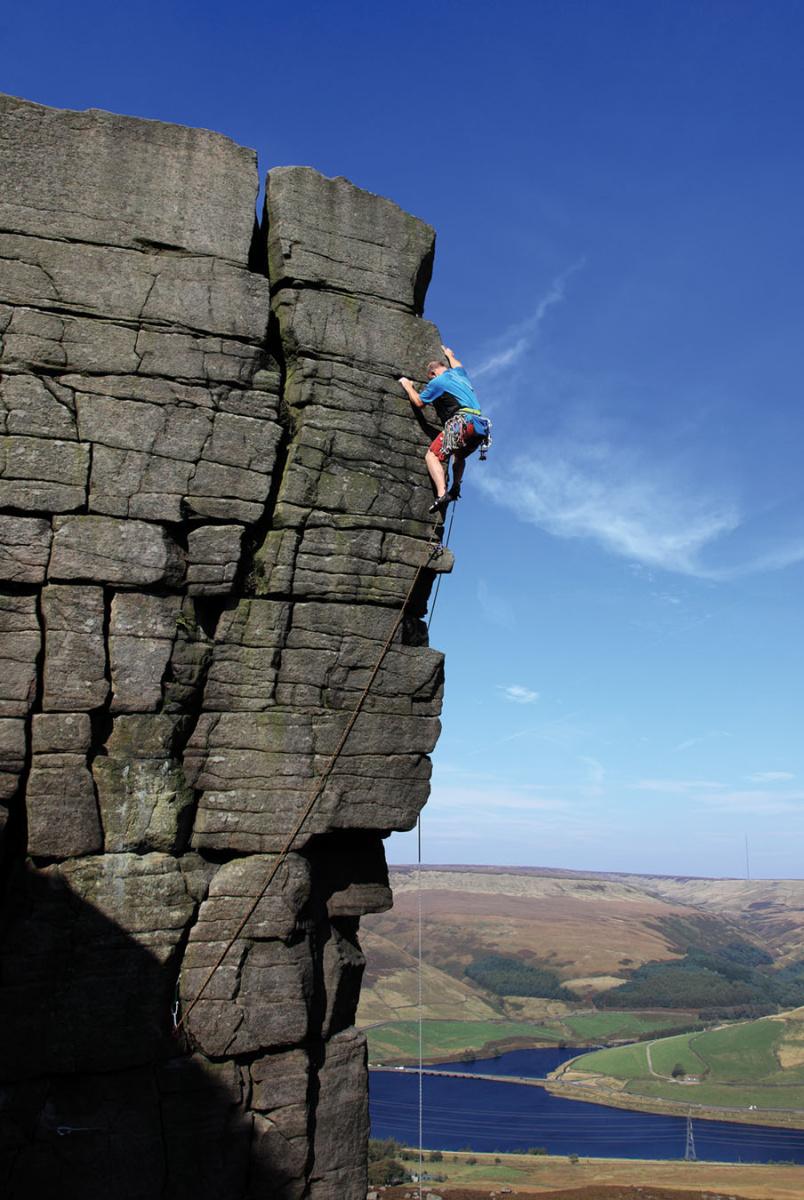 David Simmonite climbing the amazingly exposed East Rib (HVS 5a). Photo: © David Simmonite Collection/Paul Harrison