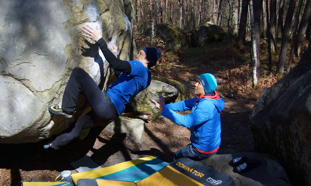 Spotting a climber off an awkward block.