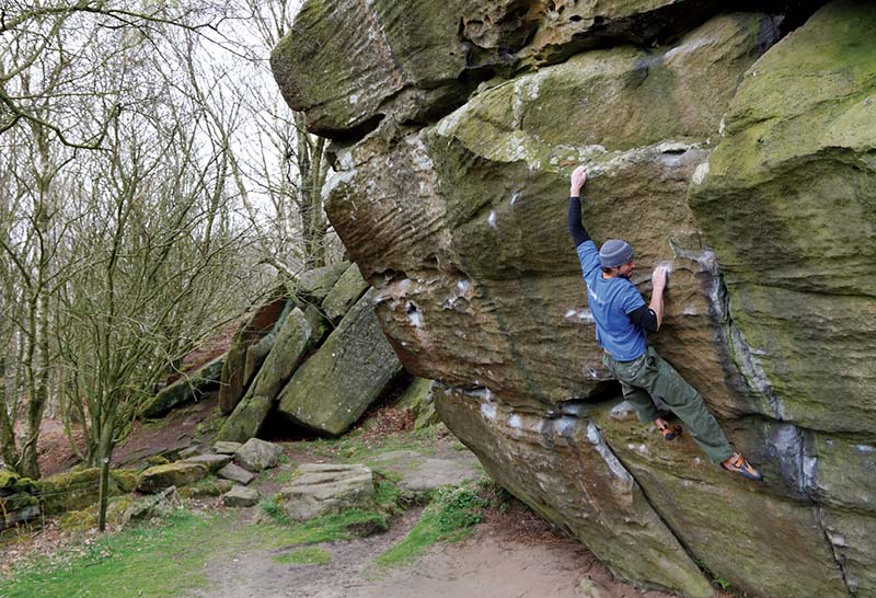 Dave Cowl makes the committing finishing moves on the strenuous Joker’s Reach (Font 6b). Photo: © David Simmonite