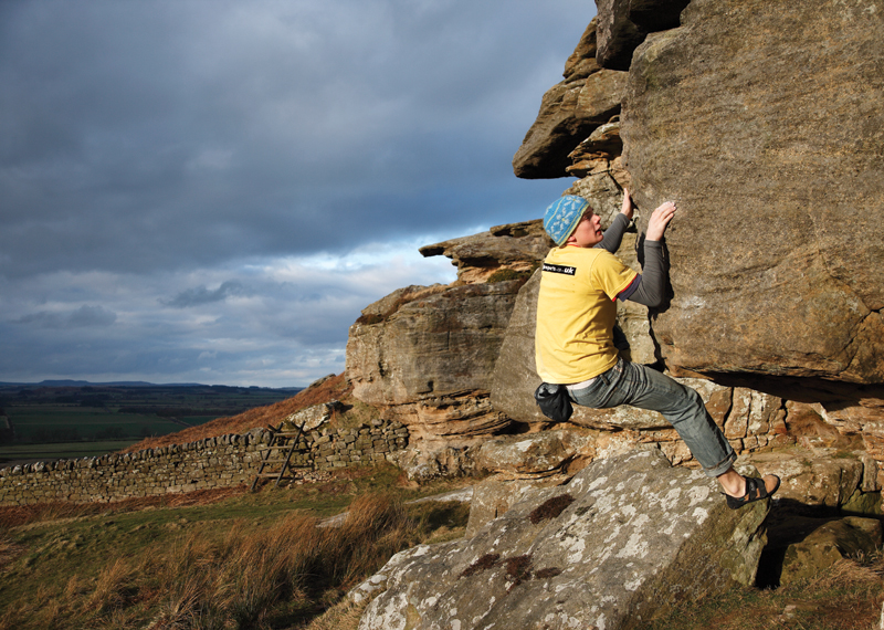 Ed Booth climbs Salt n Pepper and graded Font 5+ if climbed on the left and a tough font 6a on the right. It's located in the Central Area on Salter's Nick. Photo: © David Simmonite