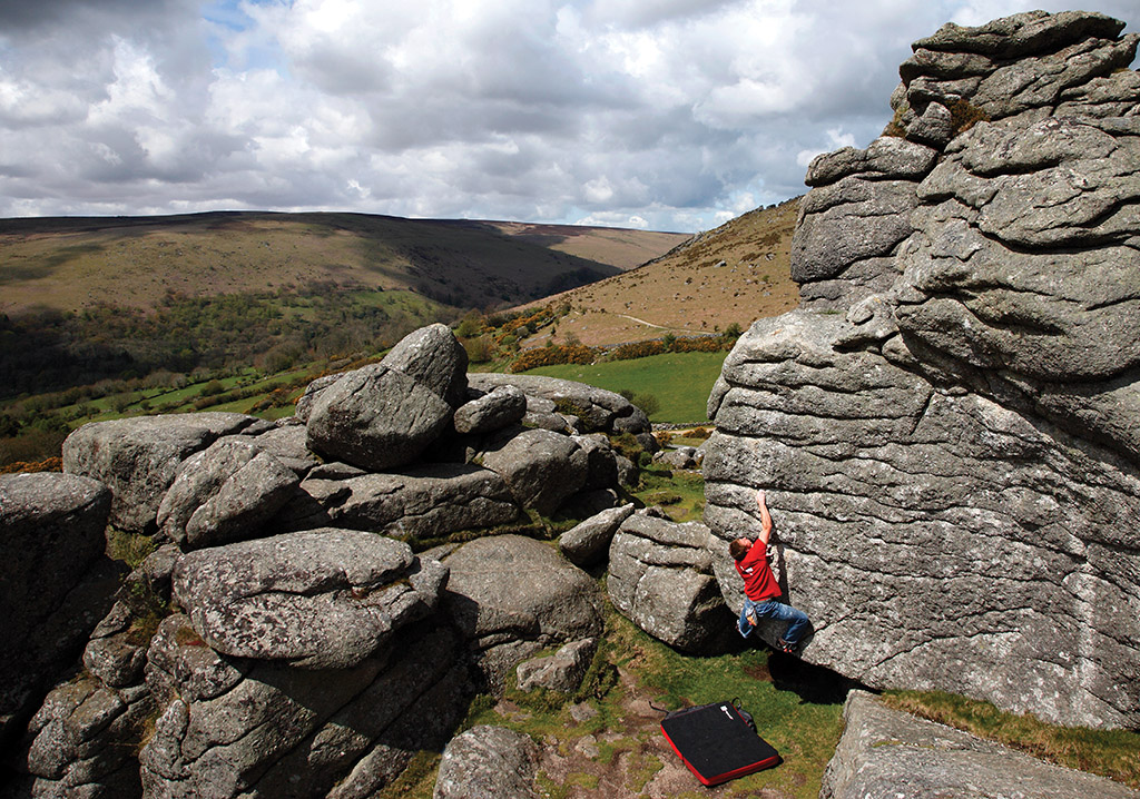Gus Hudgins pulls through the desperate start to the classic Rippled Wall (V4) before a surprisingly committing finish. Photo: © David Simmonite