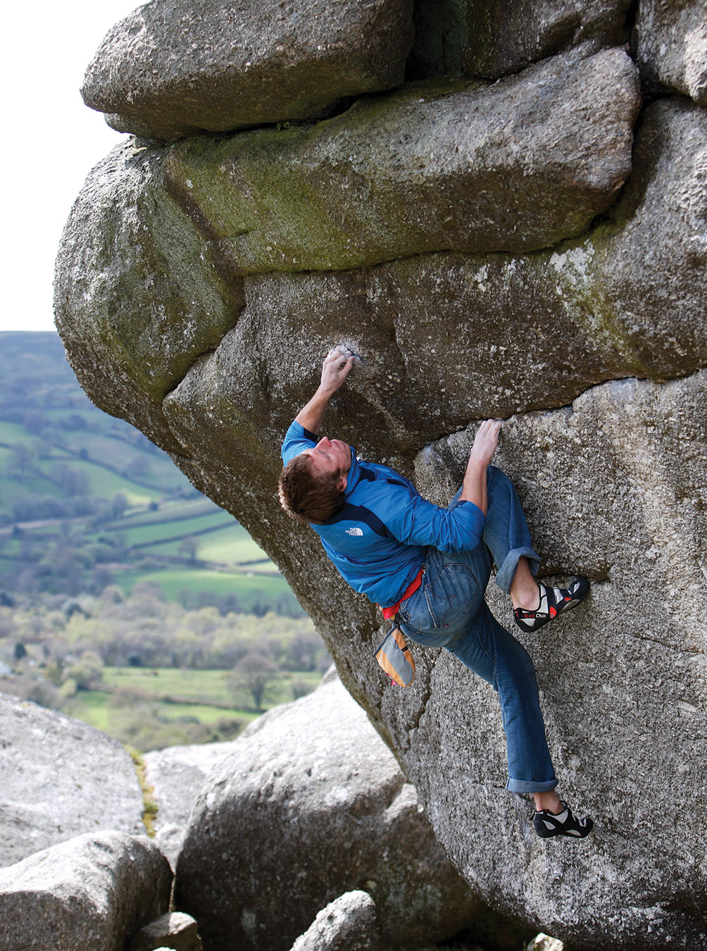 Gus Hudgins climbing Left Hander (V8) a variation on the classic The Wave (V6). The Wave takes the hold that Gus his using for his left hand with the right hand and moves left to a hold on the lip. Photo: © David Simmonite