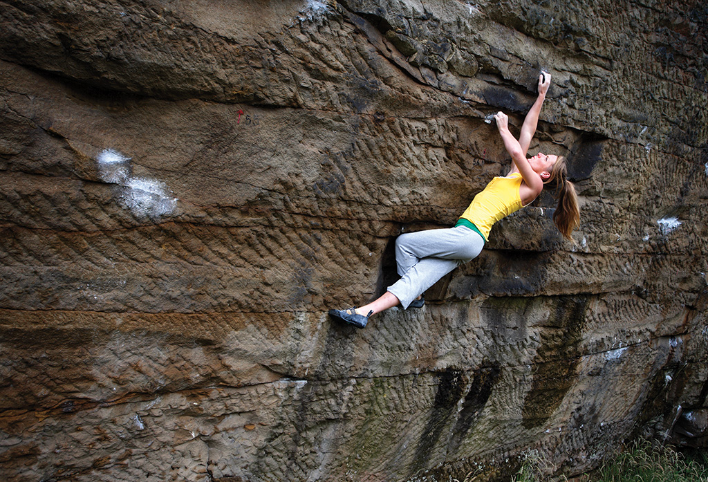 Gill Peet crimps here way up Push To Prolapse (tough V5) in the Big Marine area. The crux is at the top with a huge move from a far too small undercut. Photo: © David Simmonite
