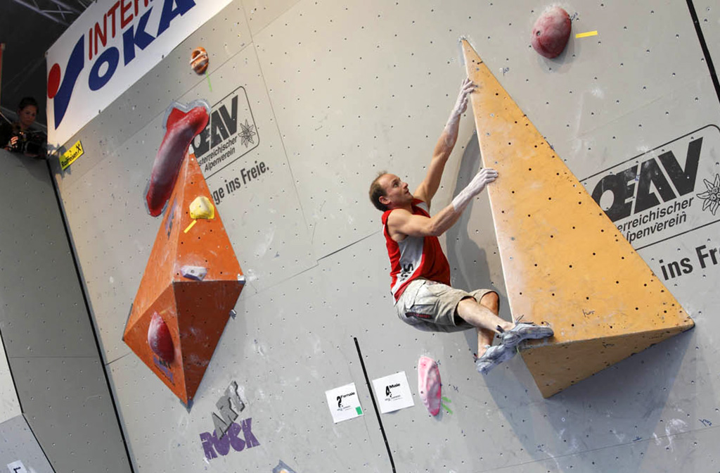 The tough end of volumes. Cedric Lachat (Switzerland) competing in the European Bouldering Championship, Innsbruck, Austria. Photo; David Simmonite